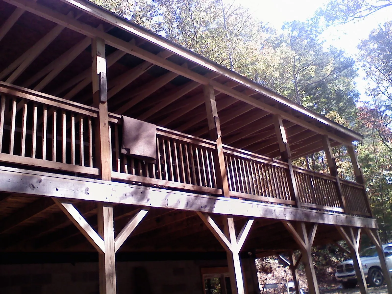 Timber framing under a new elevated porch and deck — Roof Leak Repair in Visalia by Roofing Brothers